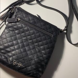 Black crossbody purse.